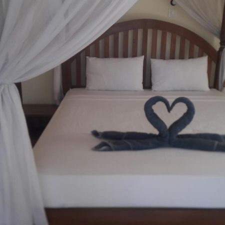 Warung Pantai Bungalows Amed Esterno foto